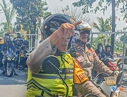 Inilah aksi Heroik Kabag Ops Polres Kediri Kota Dalam Melakukan Pengamanan Rombongan Pesilat Saat Melintasi Kediri Kota