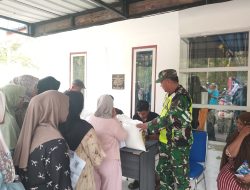 Anggota Koramil 03/TG Dampingi Penyerahan Bantuan Pangan Pemerintah