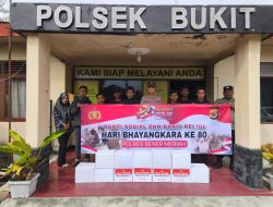 Polsek Bukit Salurkan Bansos untuk Masyarakat, Sambut Hari Bhayangkara ke-80