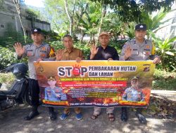 Personel Polres Aceh Tengah Pasang Spanduk Imbauan dan Sosialisasi Cegah Karhutla