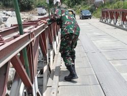 Antisipasi Musim Penghujan, Babinsa Koramil 03/TG Intensifkan Pengecekan Jembatan Bailey