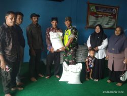 Babinsa Koramil 03/TG Dampingi Penyaluran 186 Sak Beras Banpang Untuk Warga Pante Karya