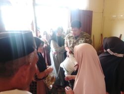 Babinsa Koramil 01/Lut Tawar Salurkan Bantuan Beras Pemerintah kepada Masyarakat Desa Kenawat